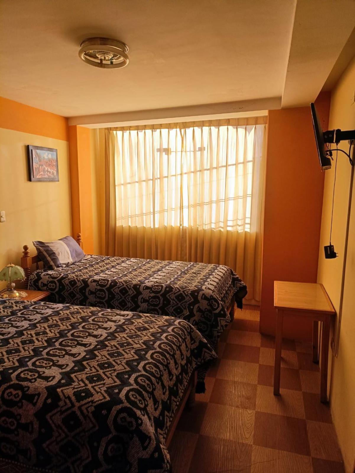 Hostal Vista Al Lago Titicaca Puno Buitenkant foto