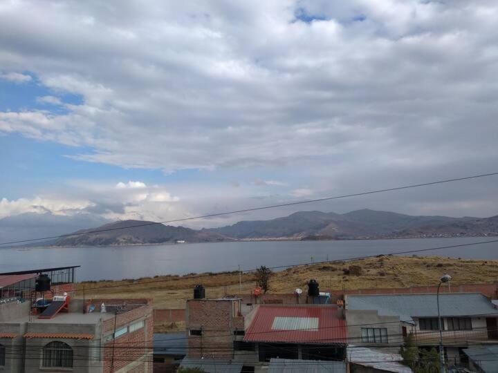 Hostal Vista Al Lago Titicaca Puno Buitenkant foto