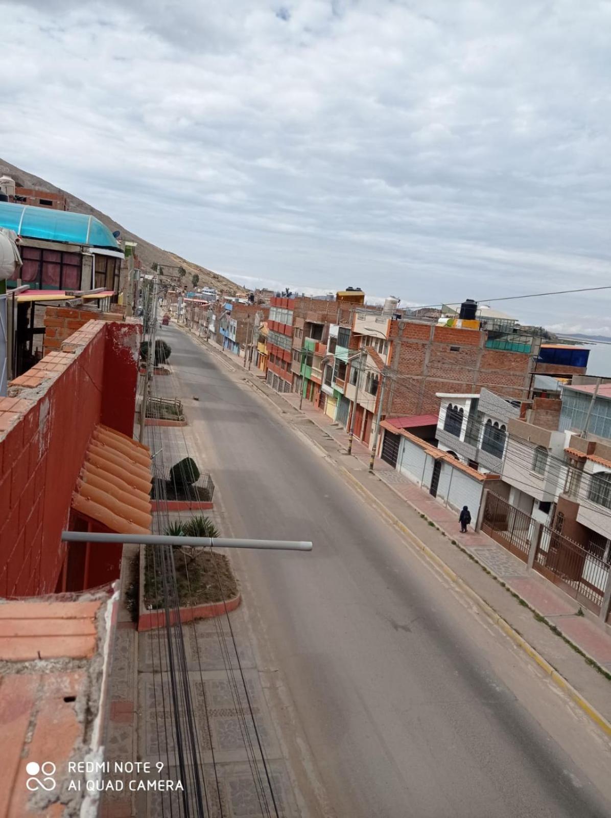 Hostal Vista Al Lago Titicaca Puno Buitenkant foto