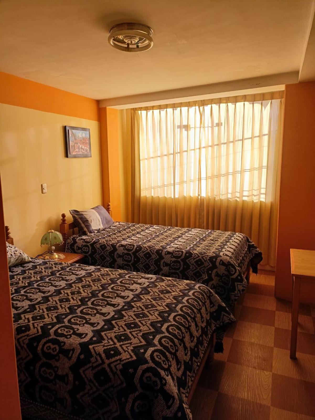 Hostal Vista Al Lago Titicaca Puno Buitenkant foto