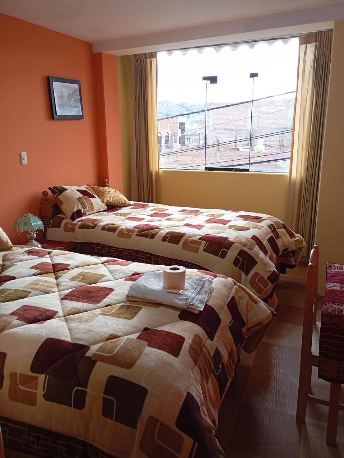 Hostal Vista Al Lago Titicaca Puno Buitenkant foto
