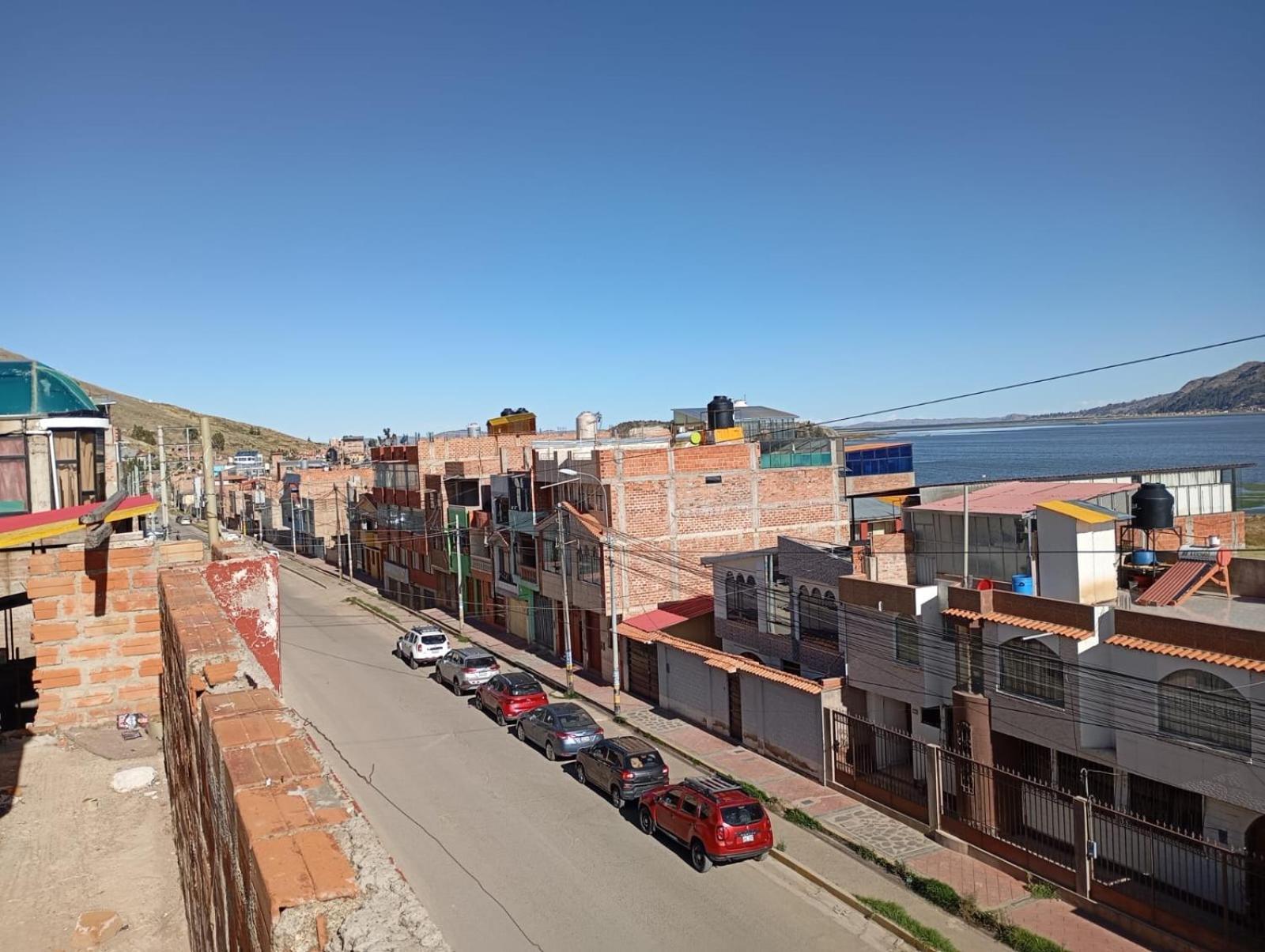 Hostal Vista Al Lago Titicaca Puno Buitenkant foto
