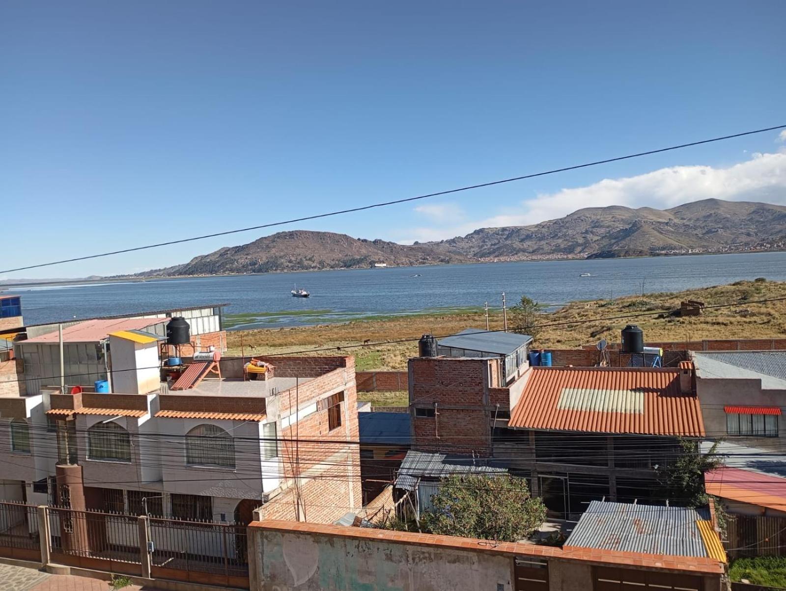 Hostal Vista Al Lago Titicaca Puno Buitenkant foto
