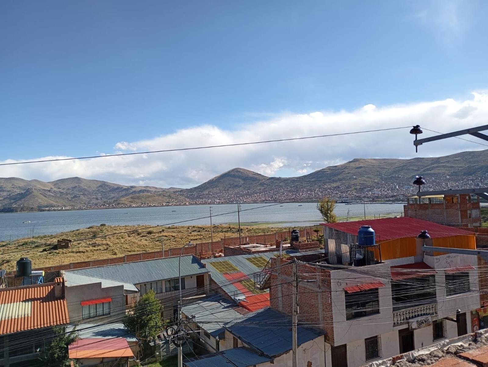 Hostal Vista Al Lago Titicaca Puno Buitenkant foto