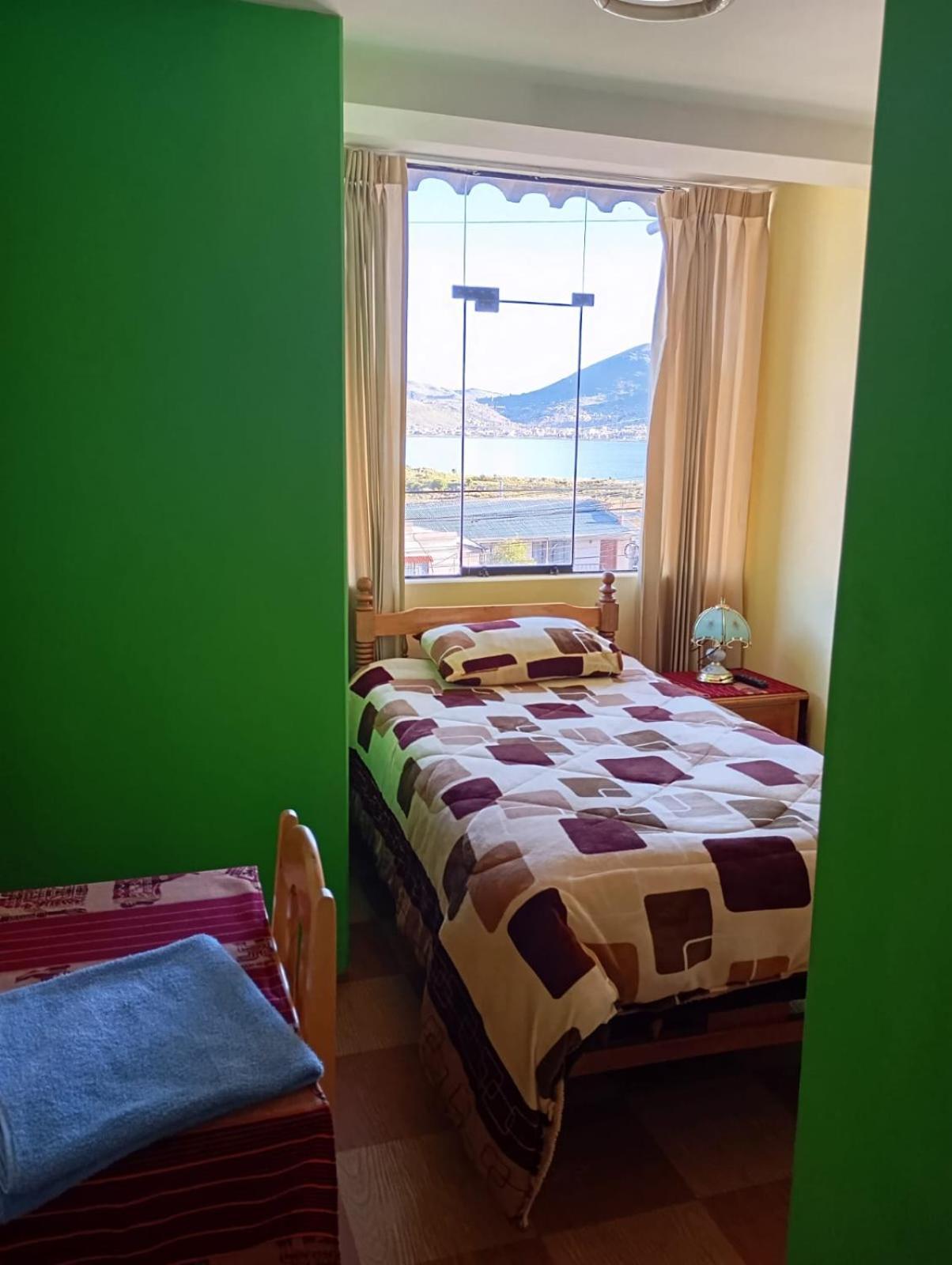 Hostal Vista Al Lago Titicaca Puno Buitenkant foto