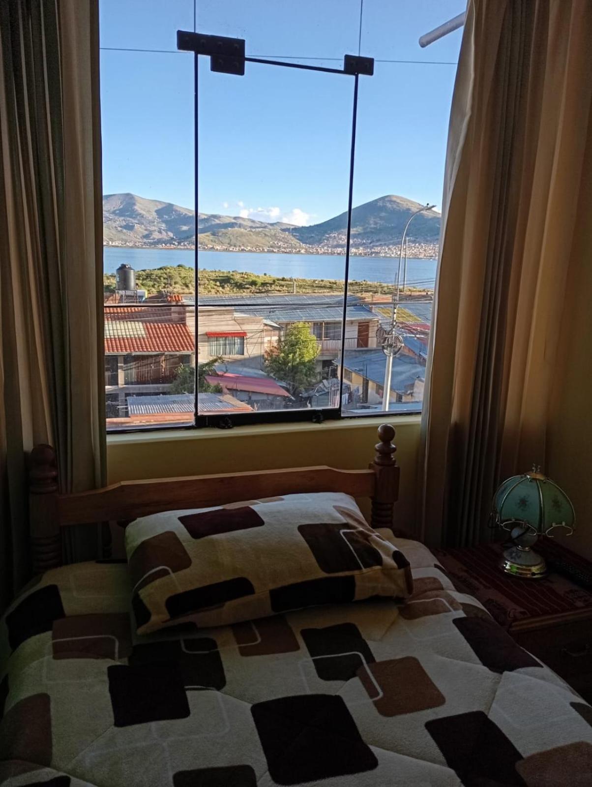 Hostal Vista Al Lago Titicaca Puno Buitenkant foto